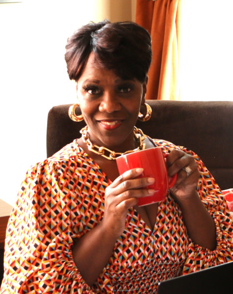 woman drink a coffee with a smile