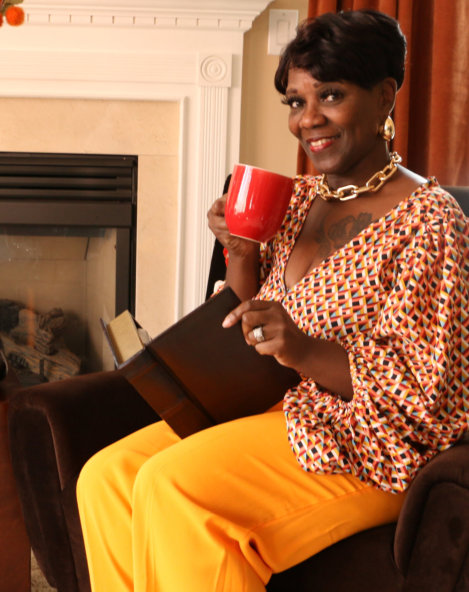 woman smiling and read a book